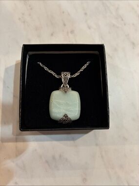 Elegant Light Mint Glass Pendant Necklace with Silver Accents
